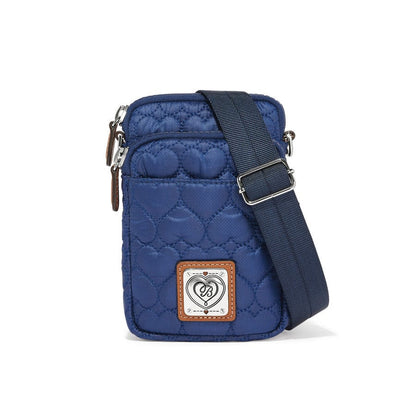 Kora Mini Utility Bag - front view showcasing the compact blue design with silver accents and heart stitching