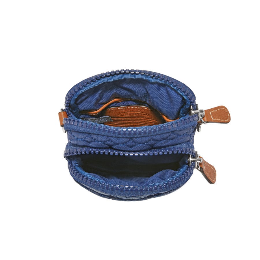 Inside view of Kora Mini Utility Bag in blue, showing the organized compartments and lining