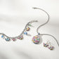 Kyoto In Bloom Butterfly Charm Bracelet close up showing necklace and earrings