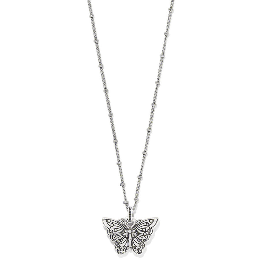 The rear side of the Kyoto In Bloom Butterfly Short Necklace a silver necklace adorned with a butterfly pendant, featuring intricate detailing. The necklace chain is delicate, with evenly spaced small beads, against a plain white background.