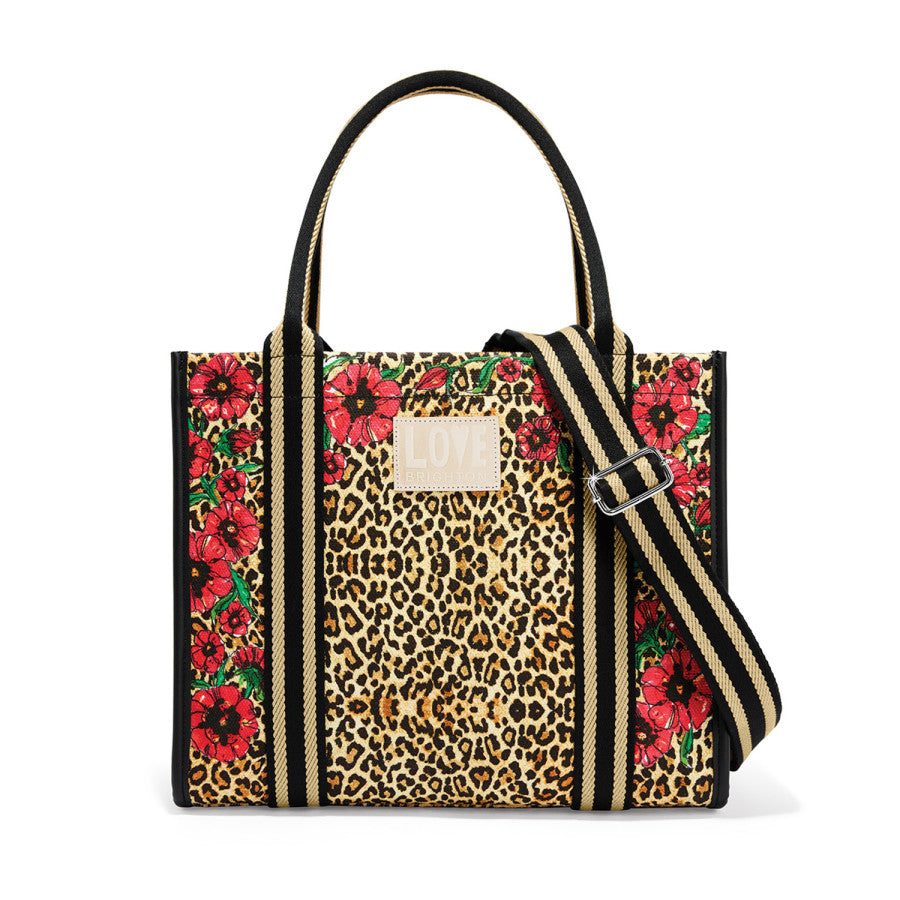 Leopard Dynasty Canvas Carry All tote with leopard and floral pattern from the front with strap showing