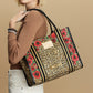 Woman wearing Leopard Dynasty Canvas Carry All tote on her shoulder