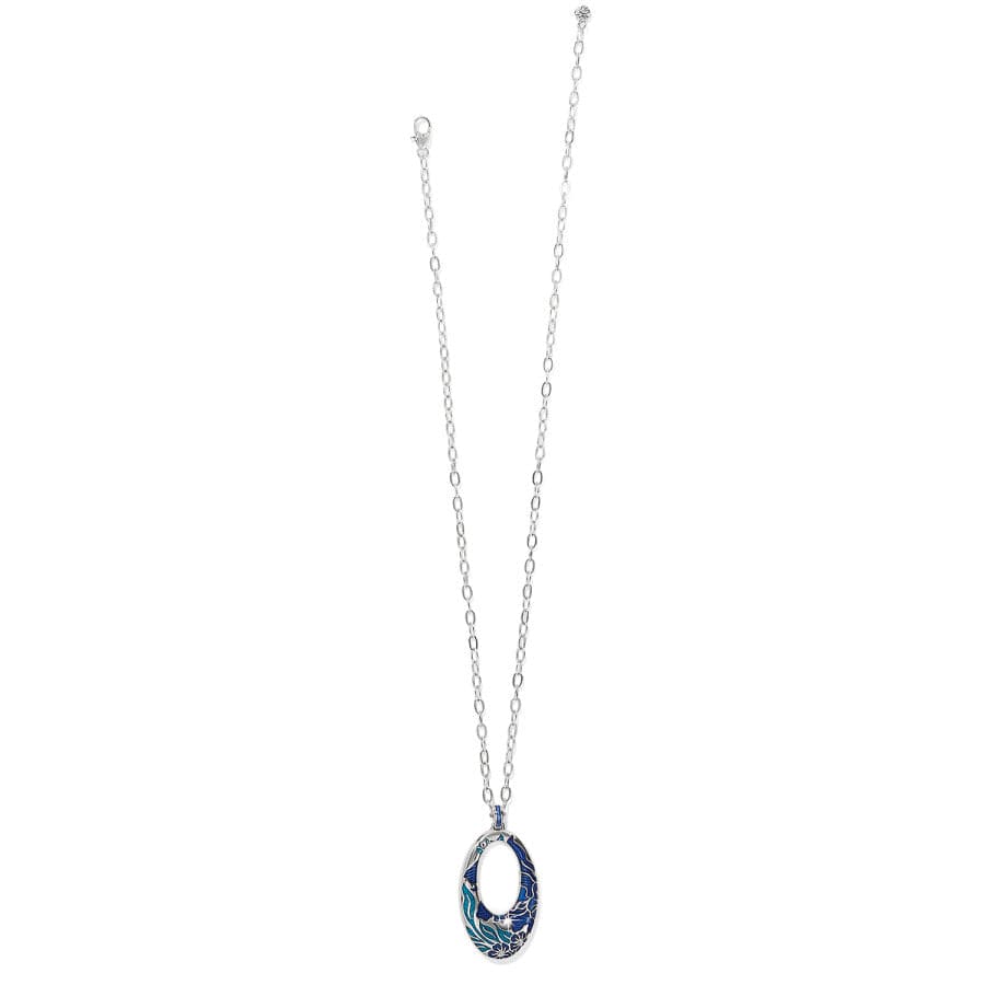 A silver Terra Blue Hoop Necklace features a long chain leading to an oval-shaped pendant with blue and green patterns, displayed against a plain white background.