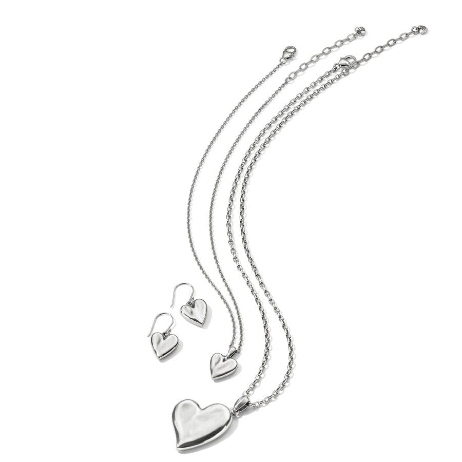 Angled view of Cascade Heart Reversible French Wire Earrings, showing the detailed heart design with matching necklace against a white background