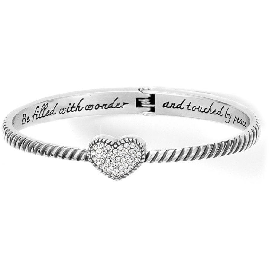 Celestia Heart Hinged Bangle a silver bracelet with a heart charm encrusted with small gems. Inscribed with 