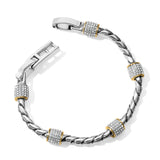 A Meridian Bracelet with silver and gold showcases a twisted rope design, punctuated by sparkling encrusted accents, displayed against a plain background.