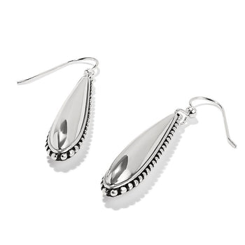 Side view of the Pretty Tough Small Droplet French Wire Earrings, a pair of silver teardrop-shaped earrings with beaded detailing is displayed against a white background.