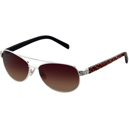 Sugar Shack Sunglasses with brown gradient lenses, metallic silver frames, and patterned design near the hinges; side arms feature a leopard print and solid black tips. Placed against a plain white background.